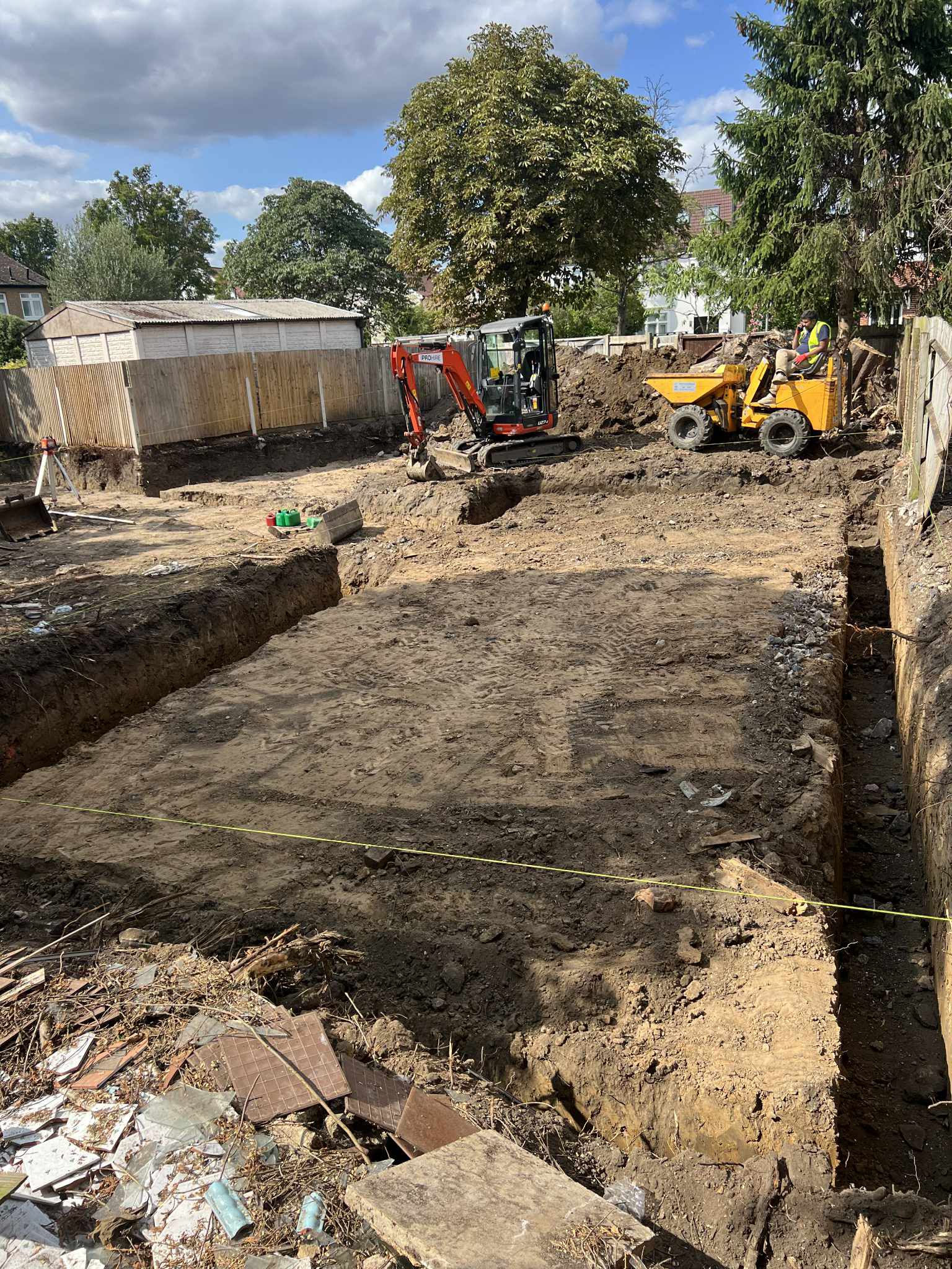 Mini excavator operator working Brent construction project